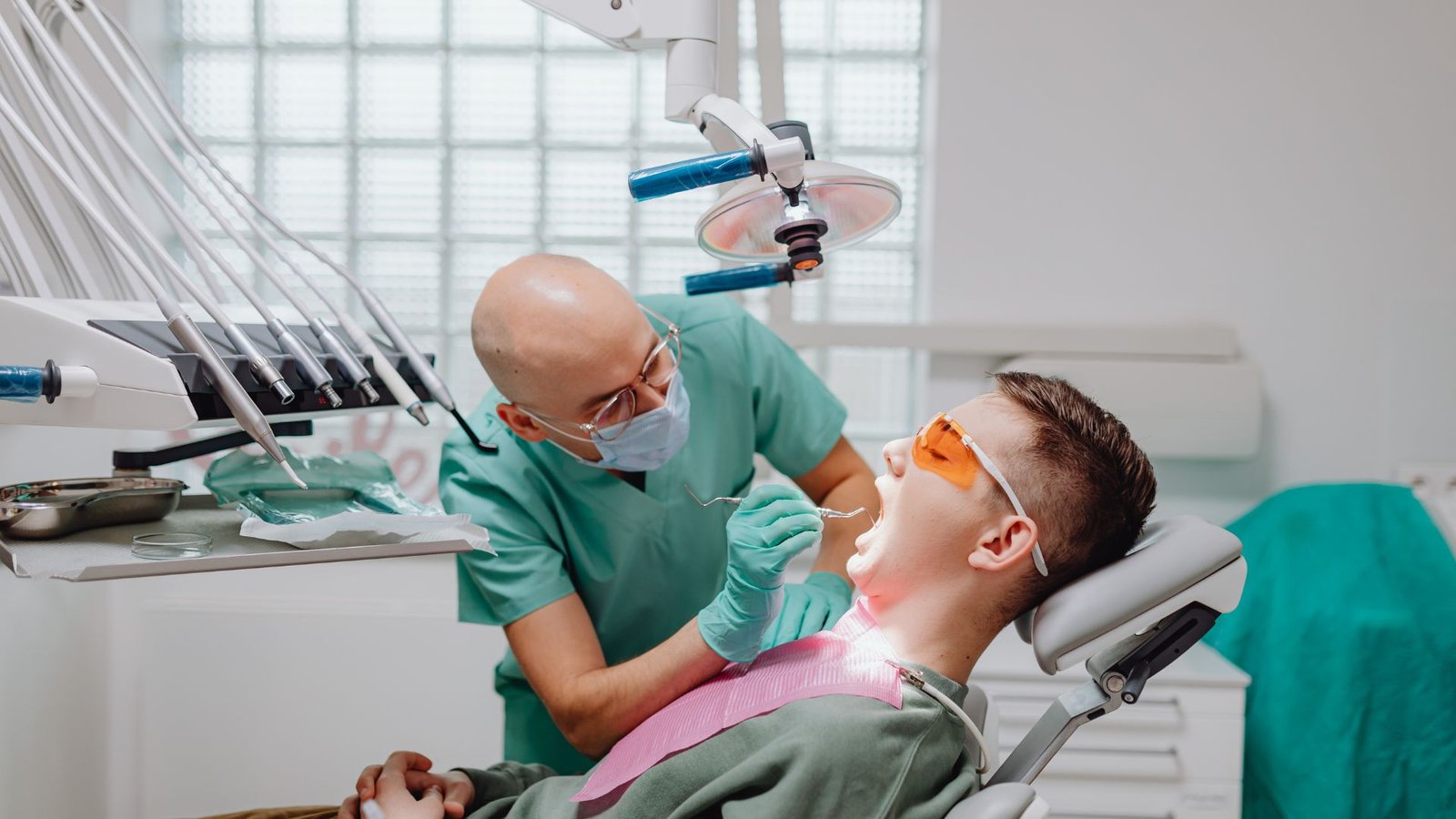 Dental hygienist cleaning teeth in Ladson, SC